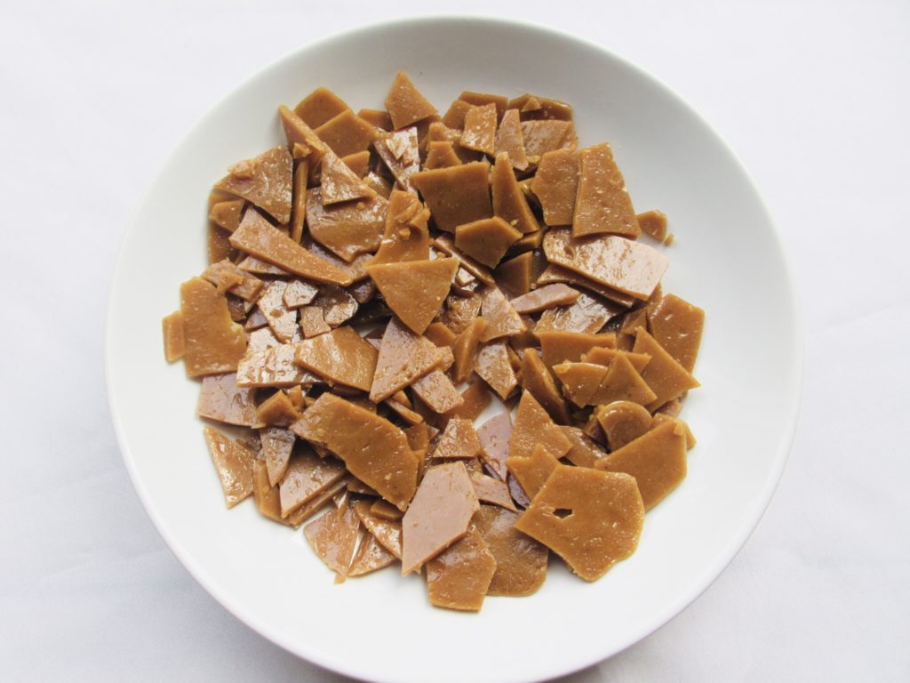 Easy english toffee pieces in white bowl