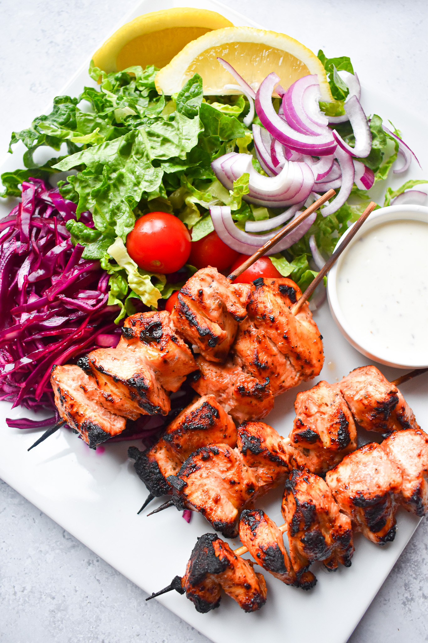 Chicken shish kebabs and salad