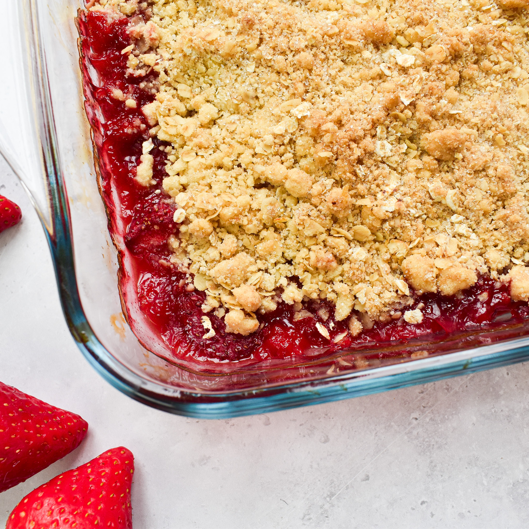 Strawberry crumble in clear dish