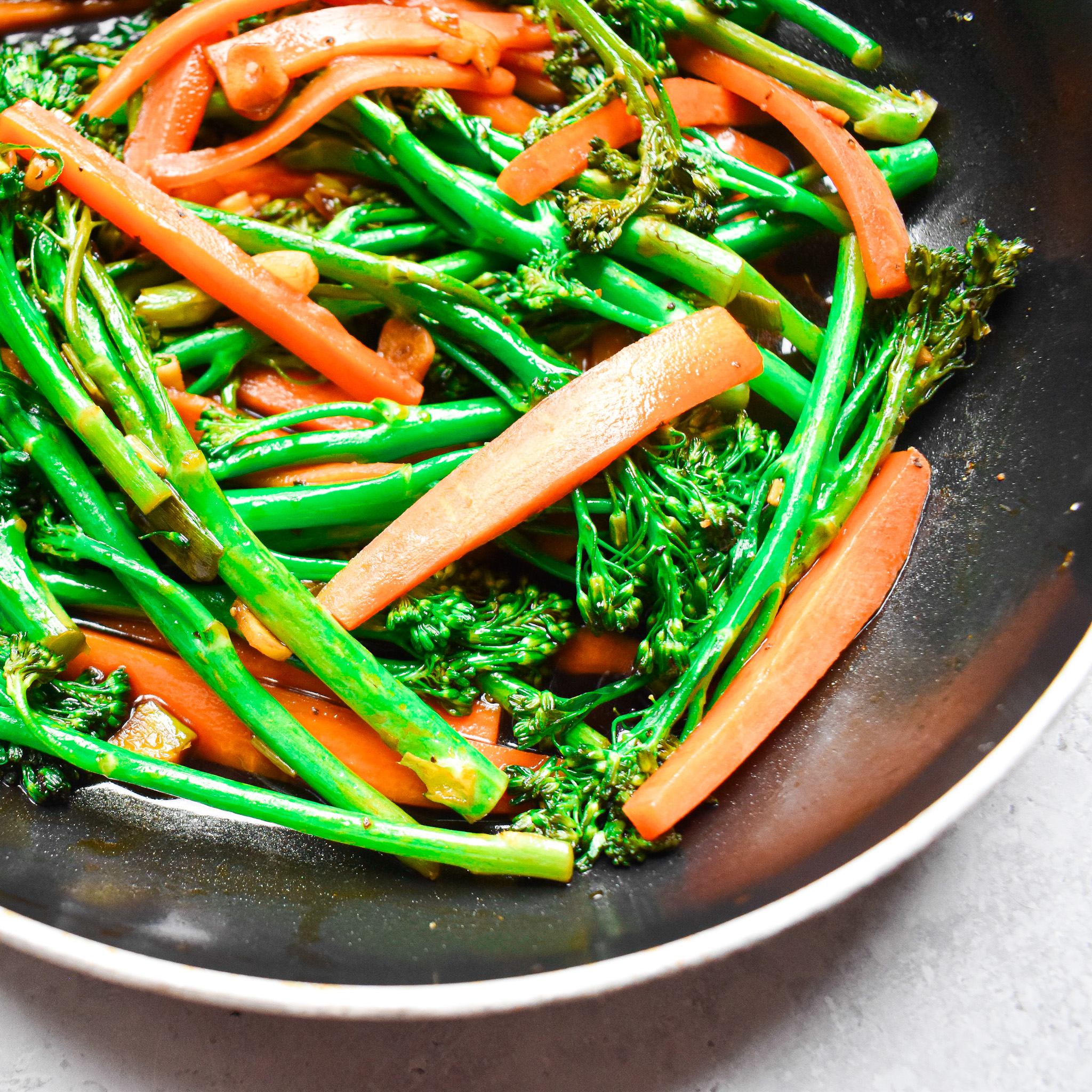 Ginger garlic tenderstem broccoli in frying pan.