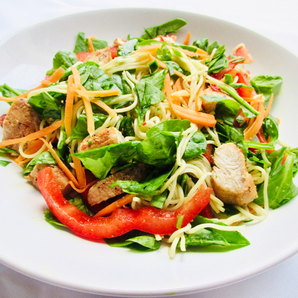 Sweet chilli salad on white plate.