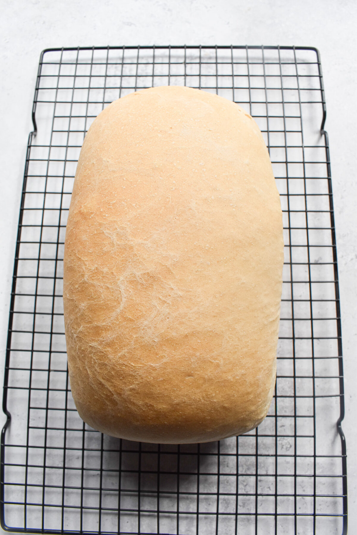 loaf of bread on wire rack