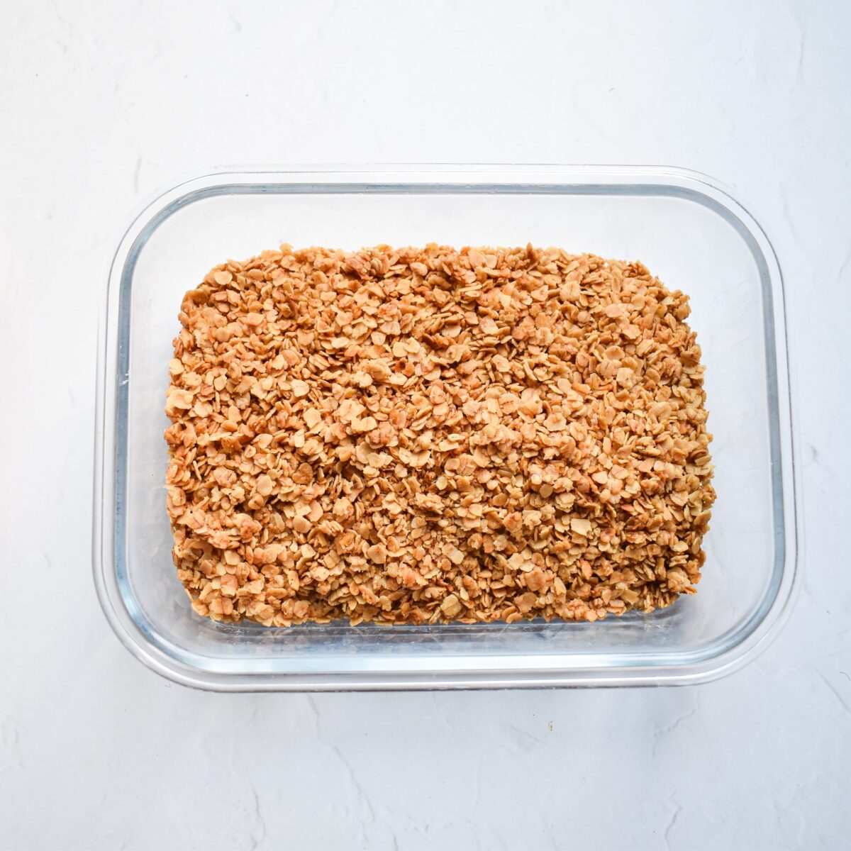 Toasted oats in storage container.